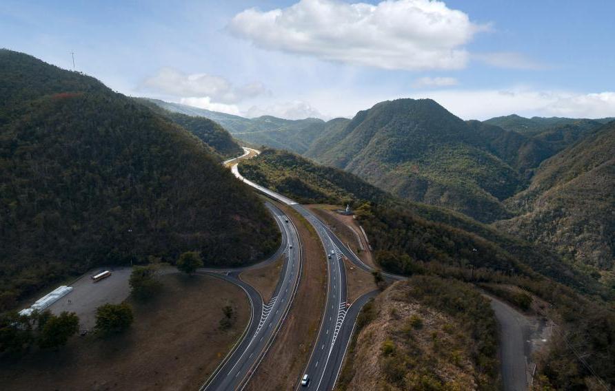 Aerial view of highway through the central mountain range in Puerto Rico.